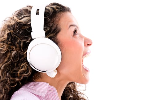 Woman listening to music and singing loud - isolated over white background-1